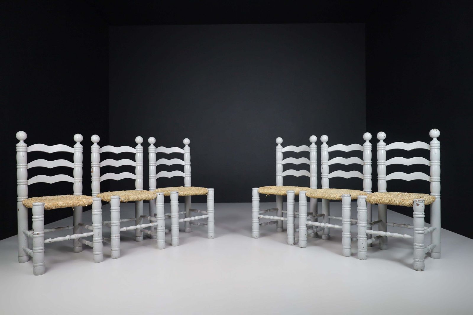 photo buy Set Of 12 Painted Oak And Rush Turned Chairs By Charles Dudouyt, France 1940
