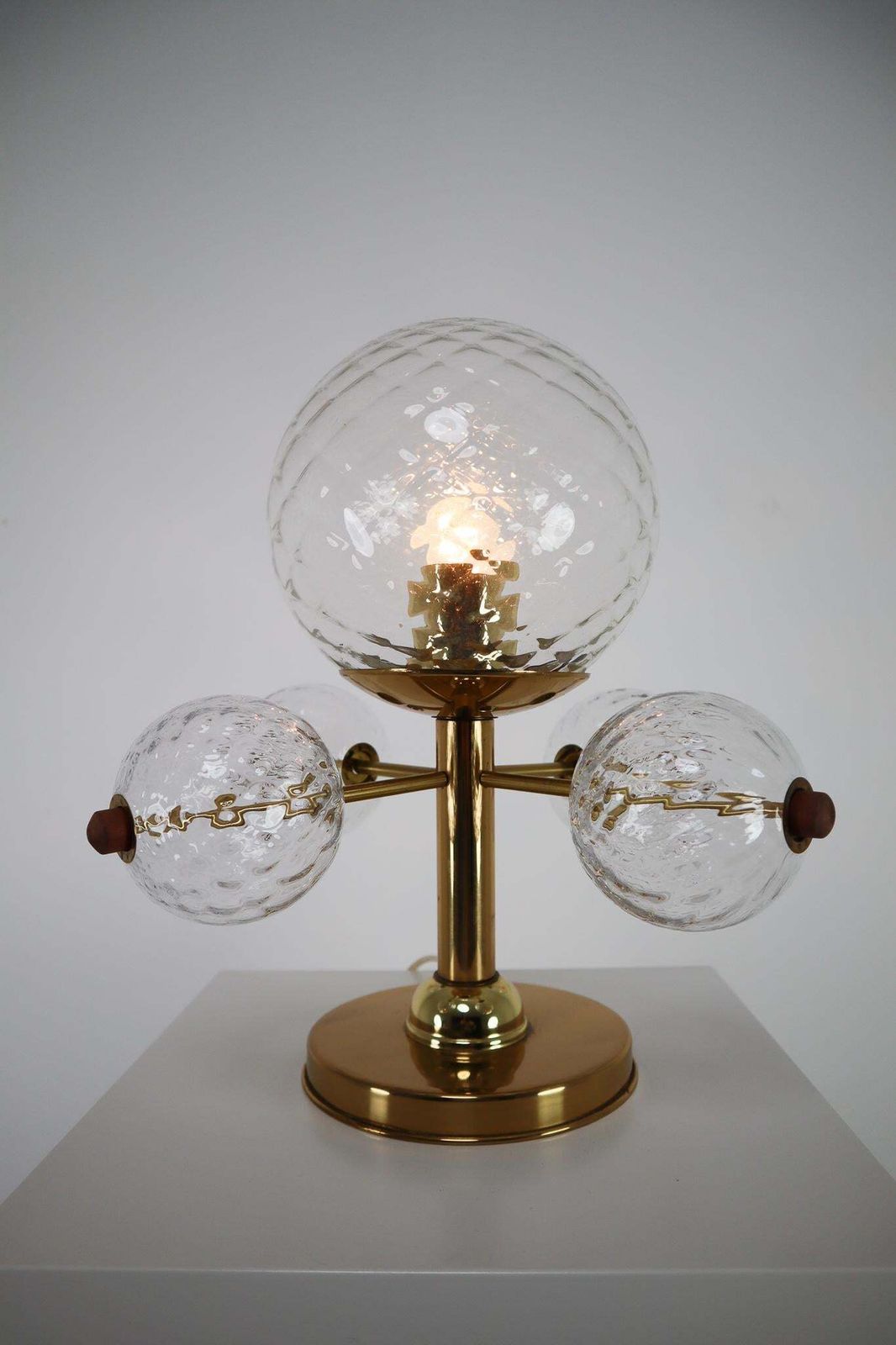 Midcentury Table Lamp With Brass Fixture And Structured Glass, Europe, 1970s photo for sale