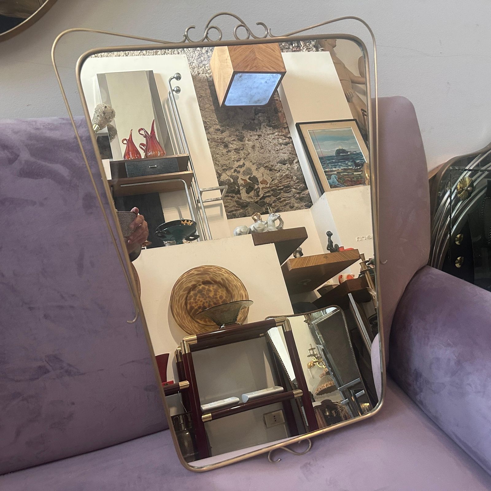 photo for sale A 1950s Mid Century Modern Brass Italian Wall Mirror In The Manner Of Gio Ponti