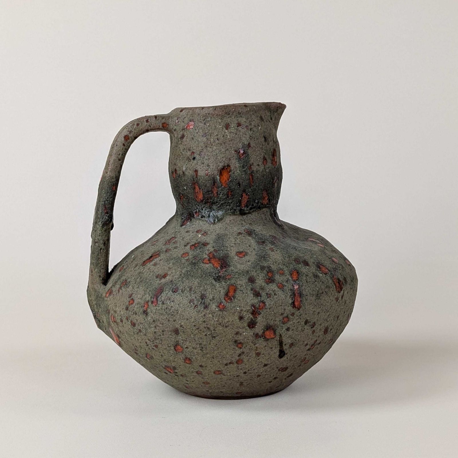 Carlo Ramo Orezza Corsica Pottery Pitcher: Mid Century Volcanic Glaze Jug, Grey Green Orange Textured Art Ceramic photo furniture