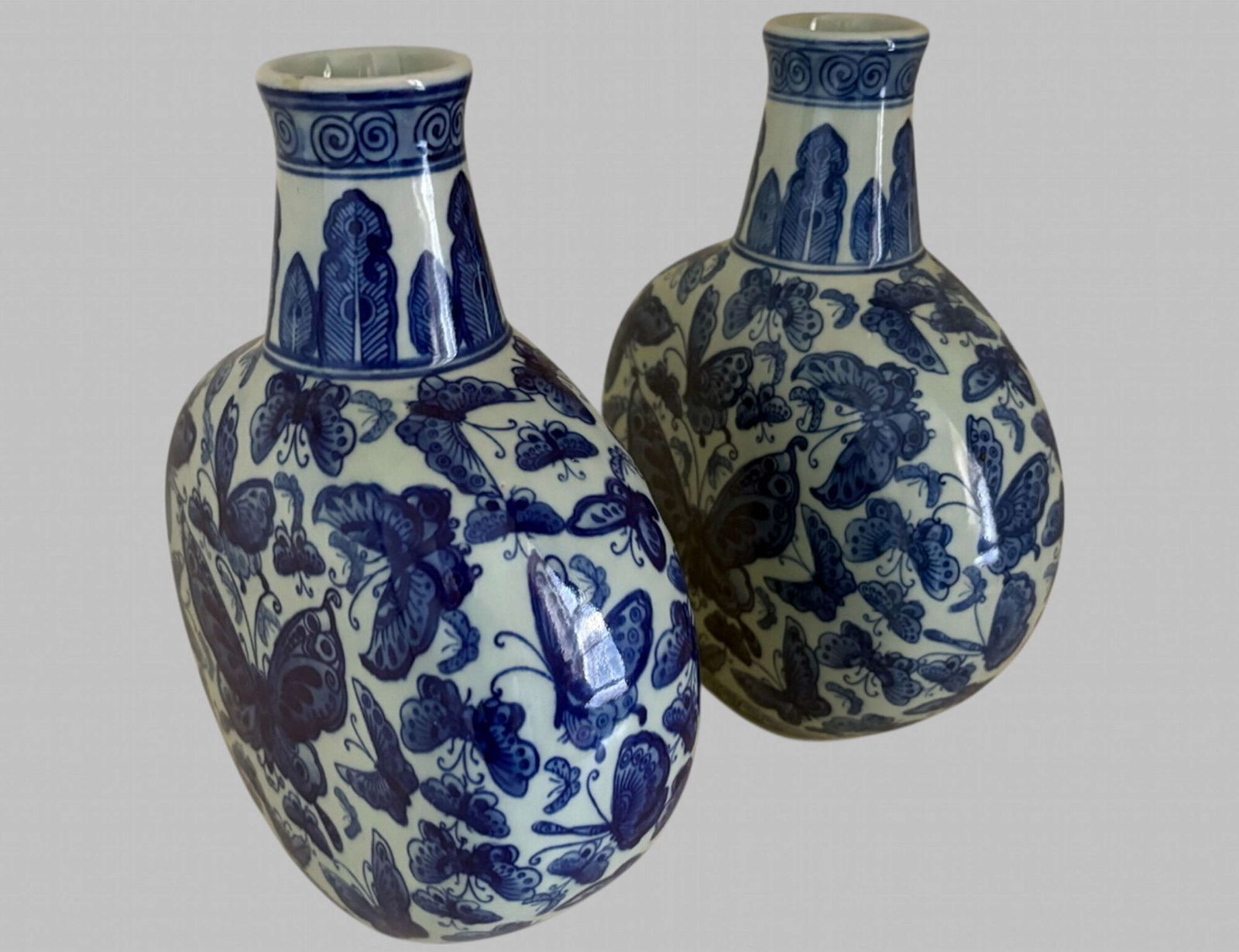 A Pair Of Matched Moon Flask Inspired Vases photo furniture