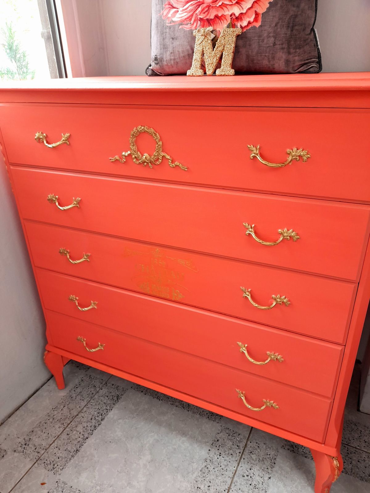 Furniture Olympus Five Drawer Chest. Hand Finished In Flamingo With Gold Highlights And Chateau Crest photo