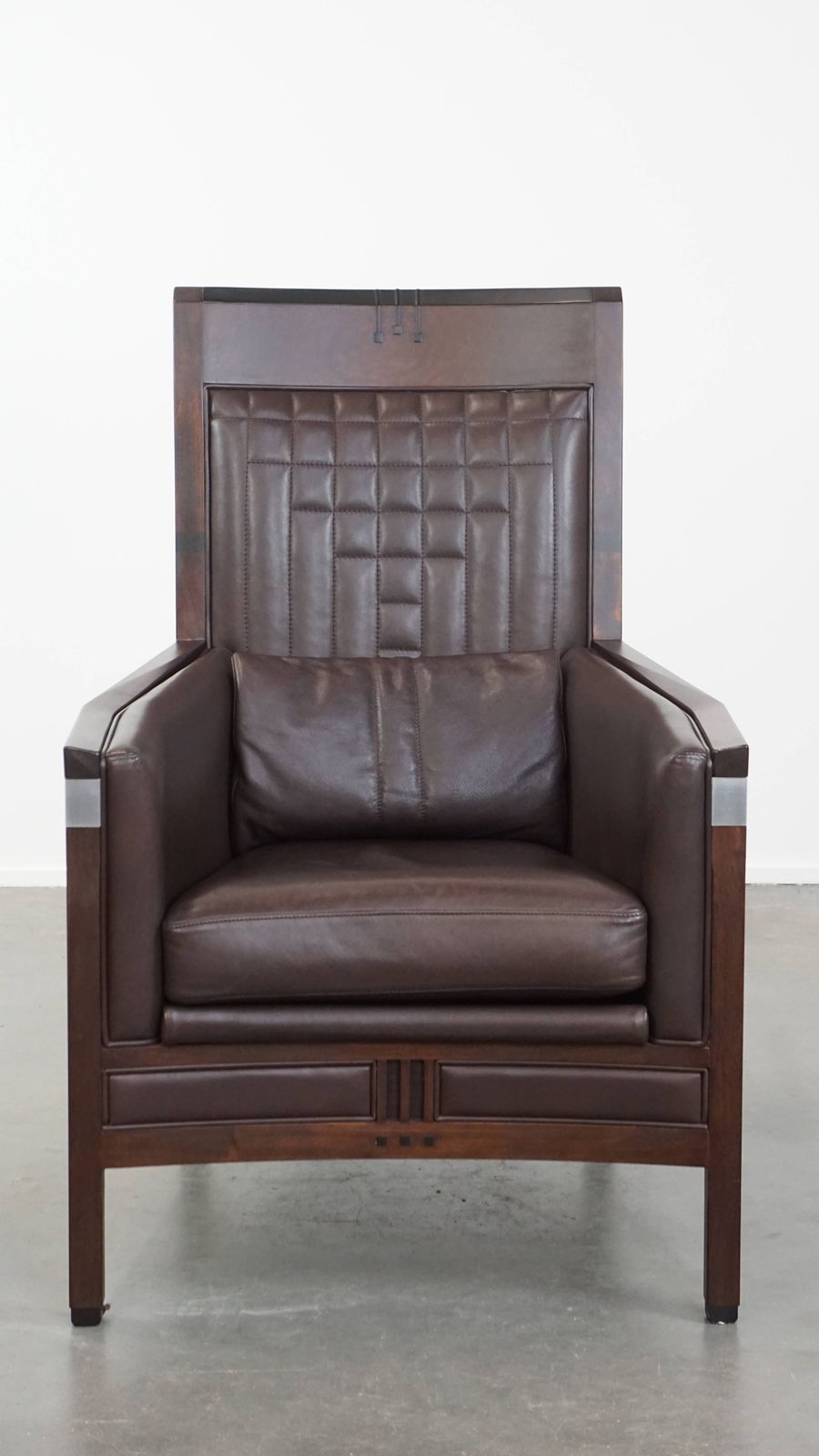 Luxurious Art Deco Design Armchair With Dark Brown Leather With Decorative Stitching photo furniture