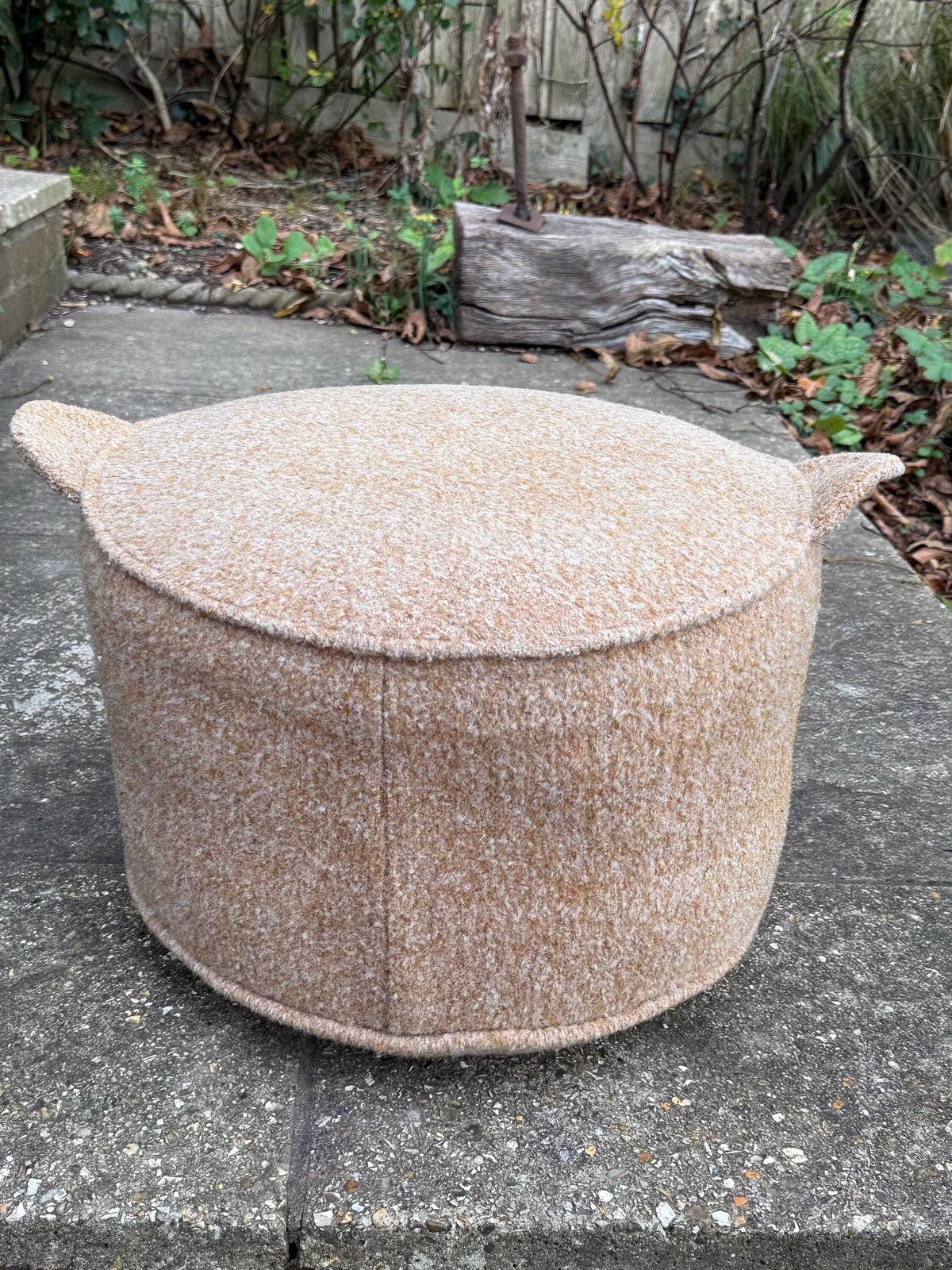 photo vintage Vintage Retro Wool Covered Pouf Footstool In Soft Camel Tan With Ear Like Handles