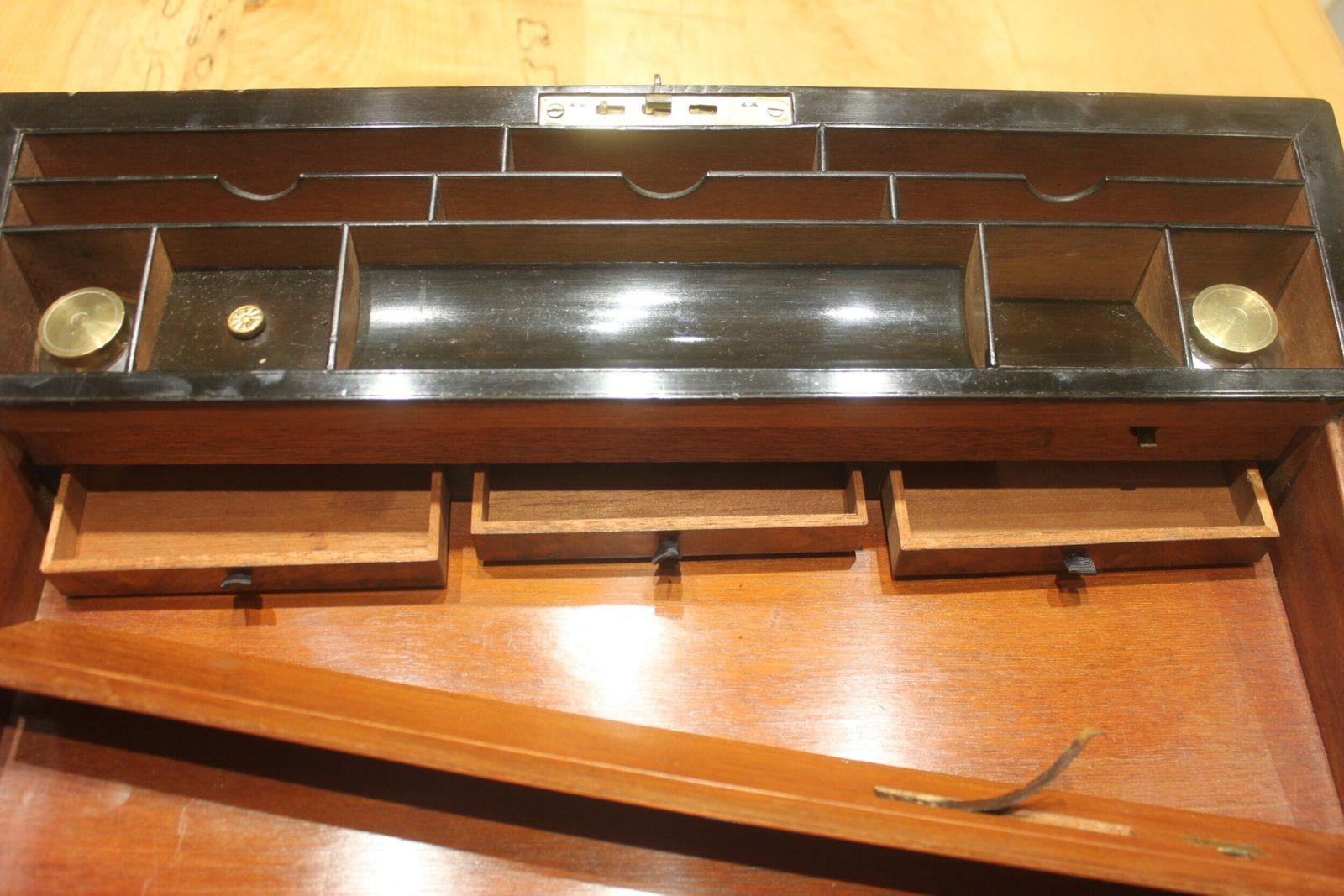 1024.0 A Large And Impressive Figured Walnut And Brass Bound Writing Slope With Secret Drawers photo