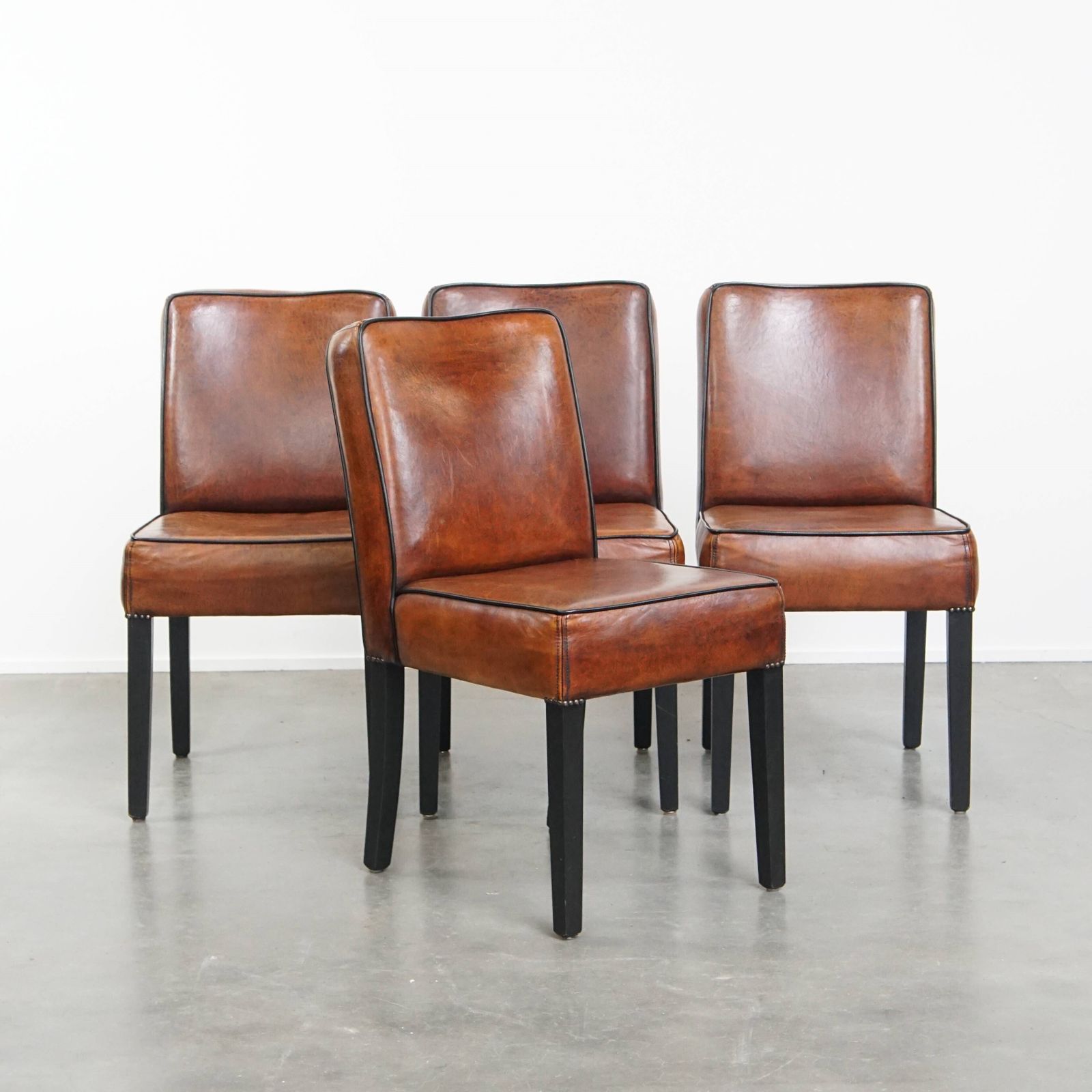 Luxurious Set Of 4 Comfortable Dining Chairs Made Of Sheepskin Finished With Black Piping