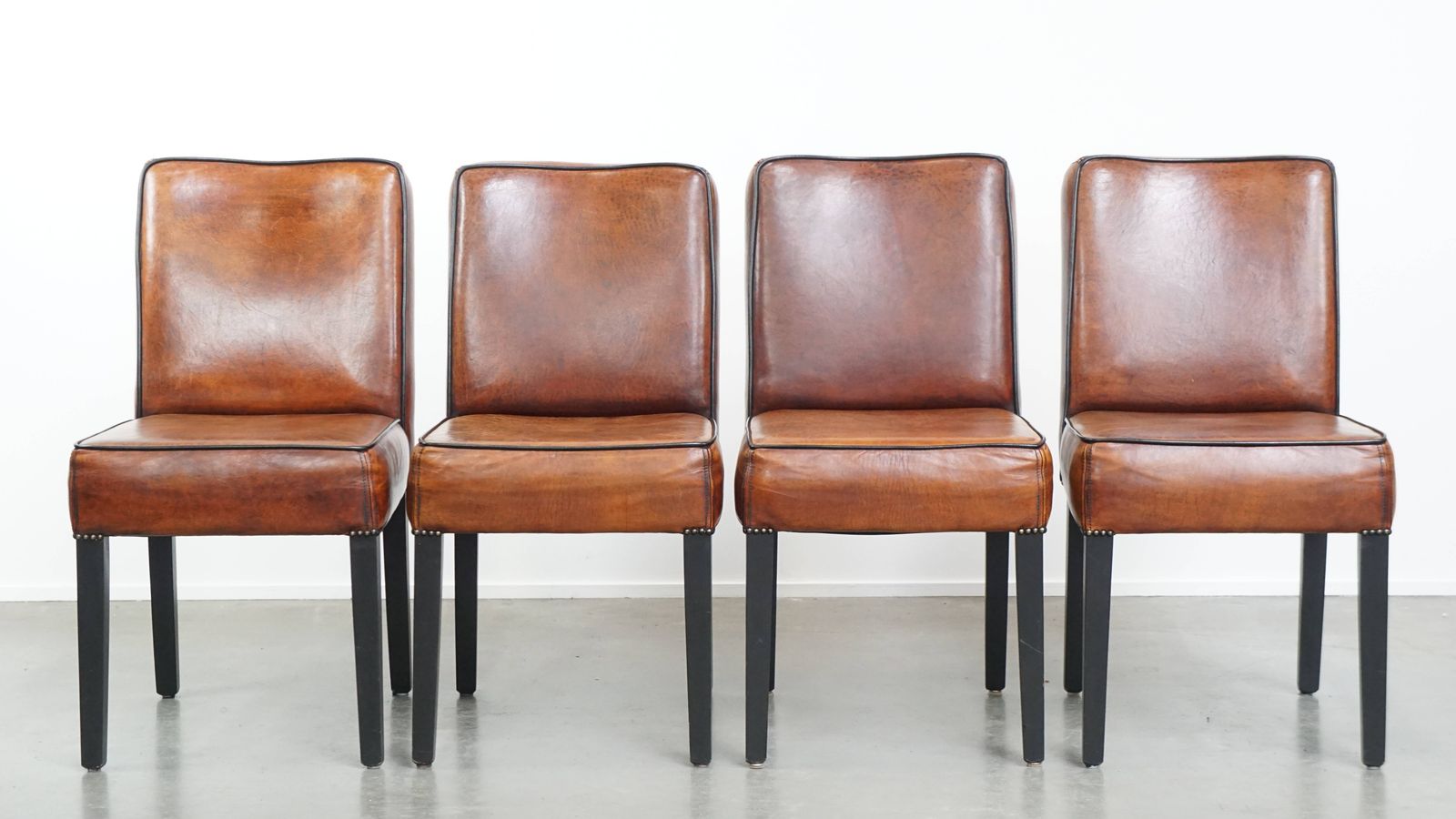 Luxurious Set Of 4 Comfortable Dining Chairs Made Of Sheepskin Finished With Black Piping photo furniture