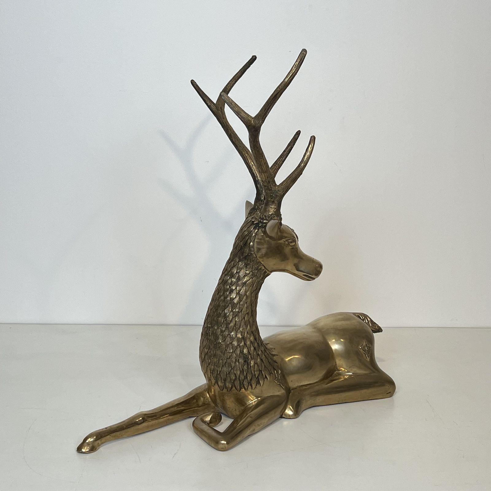 photo vintage Important Bronze Stag Reclining Engraved With Shamanic Motifs