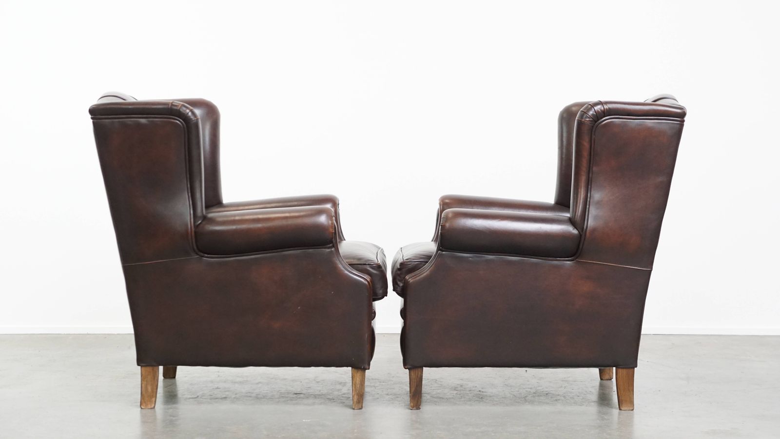 Comfortable And Very Beautiful Set Of 2 English Style Cowhide Wing Chairs With A Luxurious Finish photo furniture