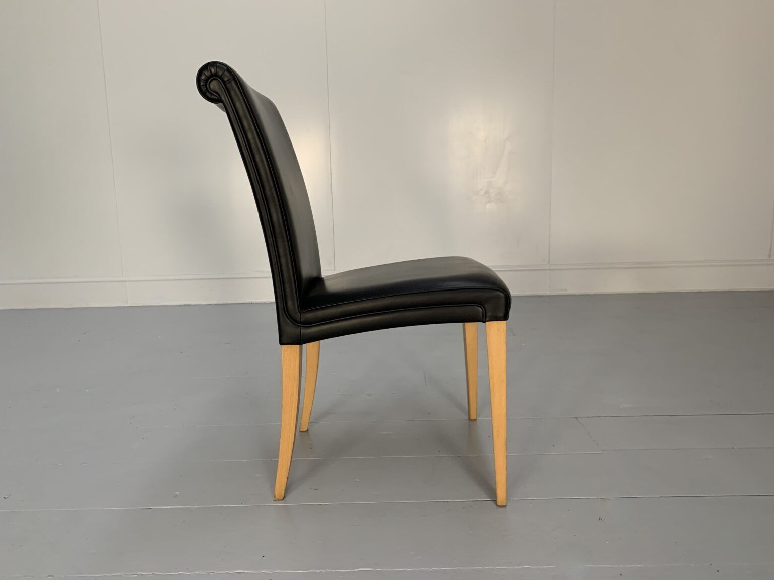 photo furniture 4 Poltrona Frau “Vittoria” Dining Chairs – In Black “Pelle Frau” Leather