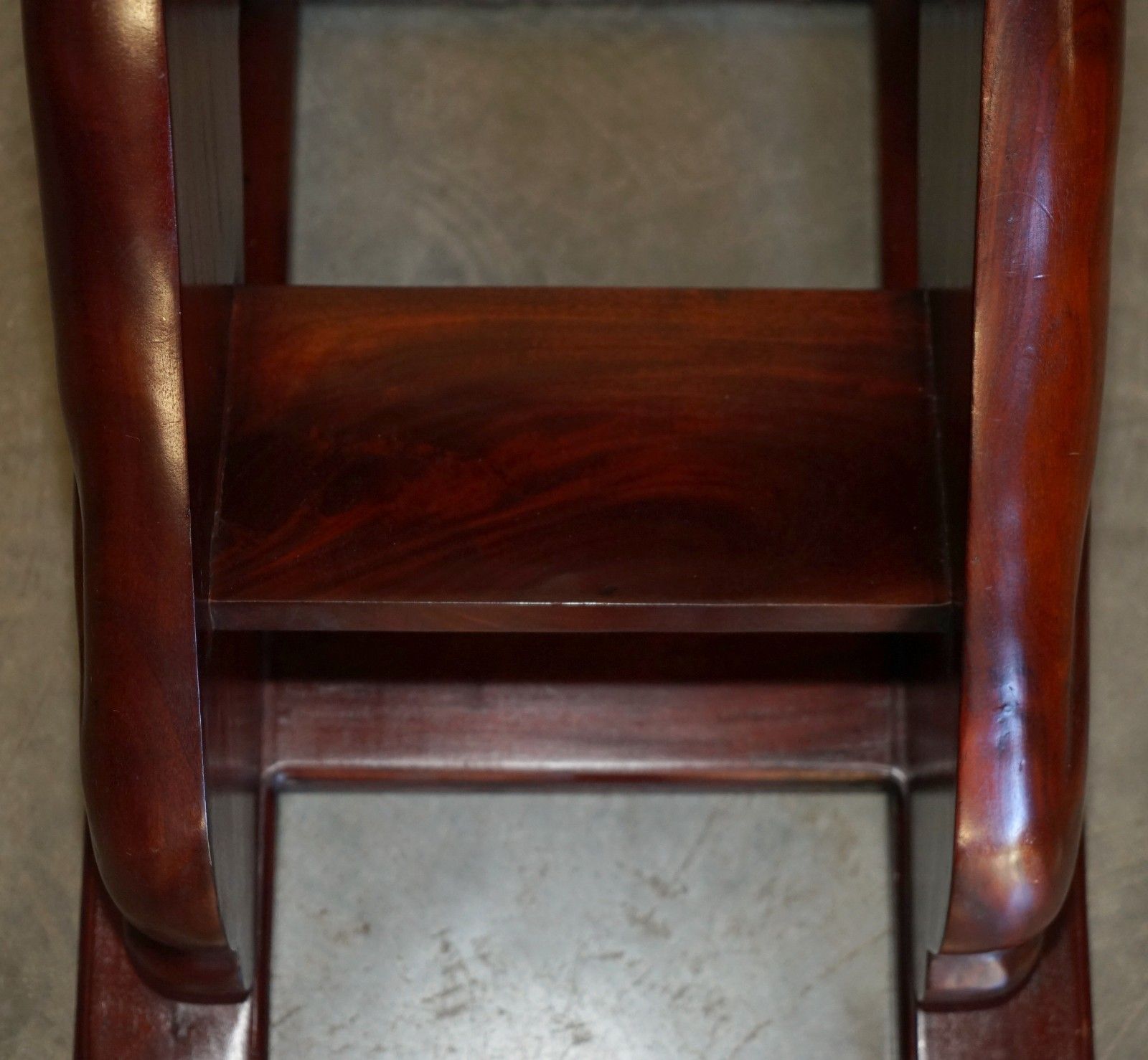 photo buy Pair Of Deep Mahogany Library Steps Depicting Ornately Carved Dogs To The Sides
