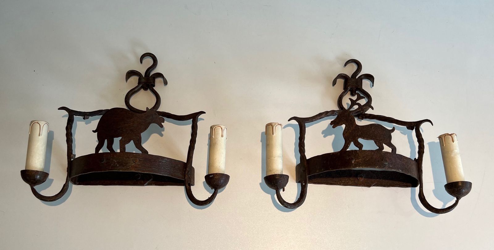 Pair Of Wrought Iron Wall Sconces Depicting Animals