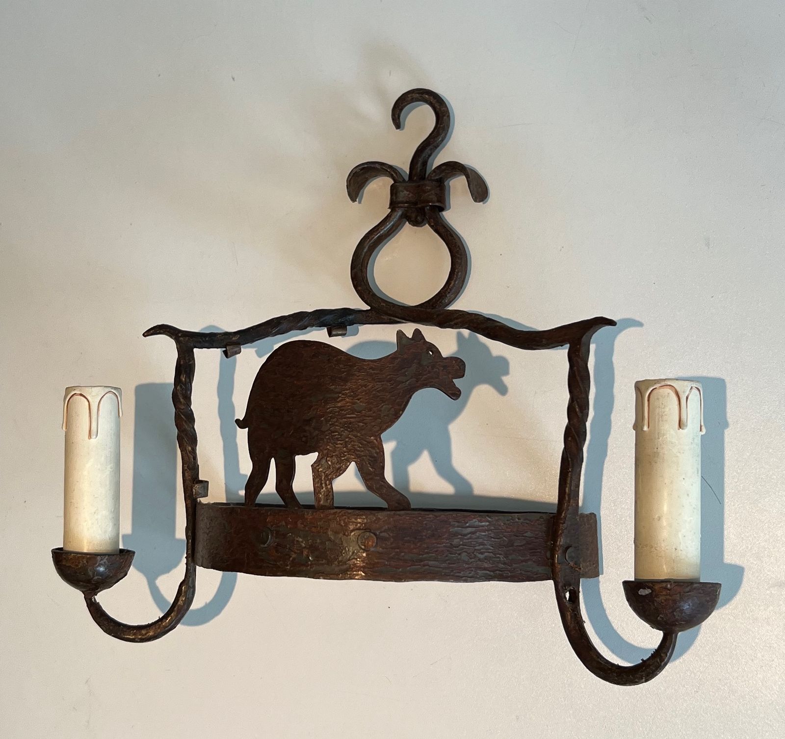 Pair Of Wrought Iron Wall Sconces Depicting Animals photo for sale