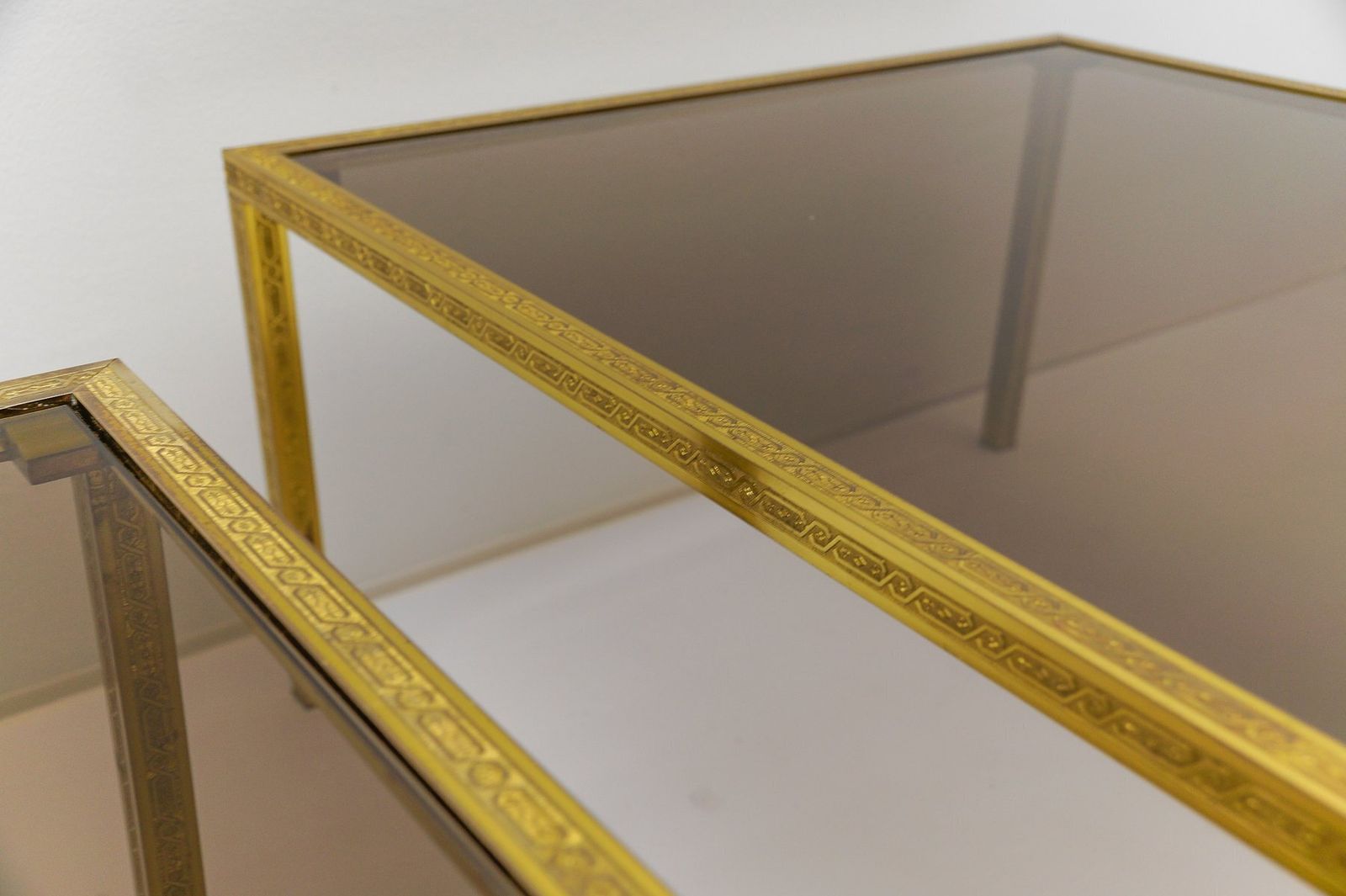 photo for sale Brass And Smoked Glass Coffee Tables With Ornaments, 1970s, Set Of 2