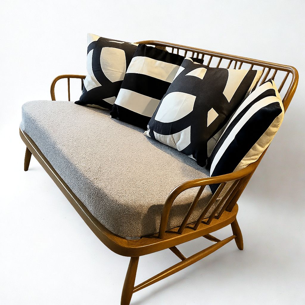 Ercol Jubilee 766/2 Two Seater Sofa With Grey Boucle Fabric And Monochrome Scatter Cushions photo for sale