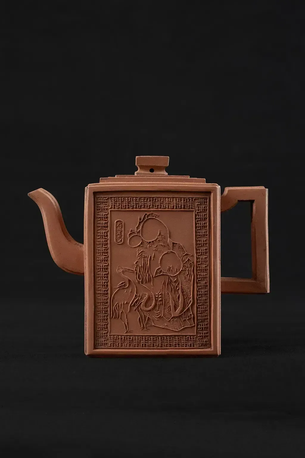 Traditional Yixing Stoneware Teapot Depicting Shouxing Shou Lao And His Attributes photo furniture