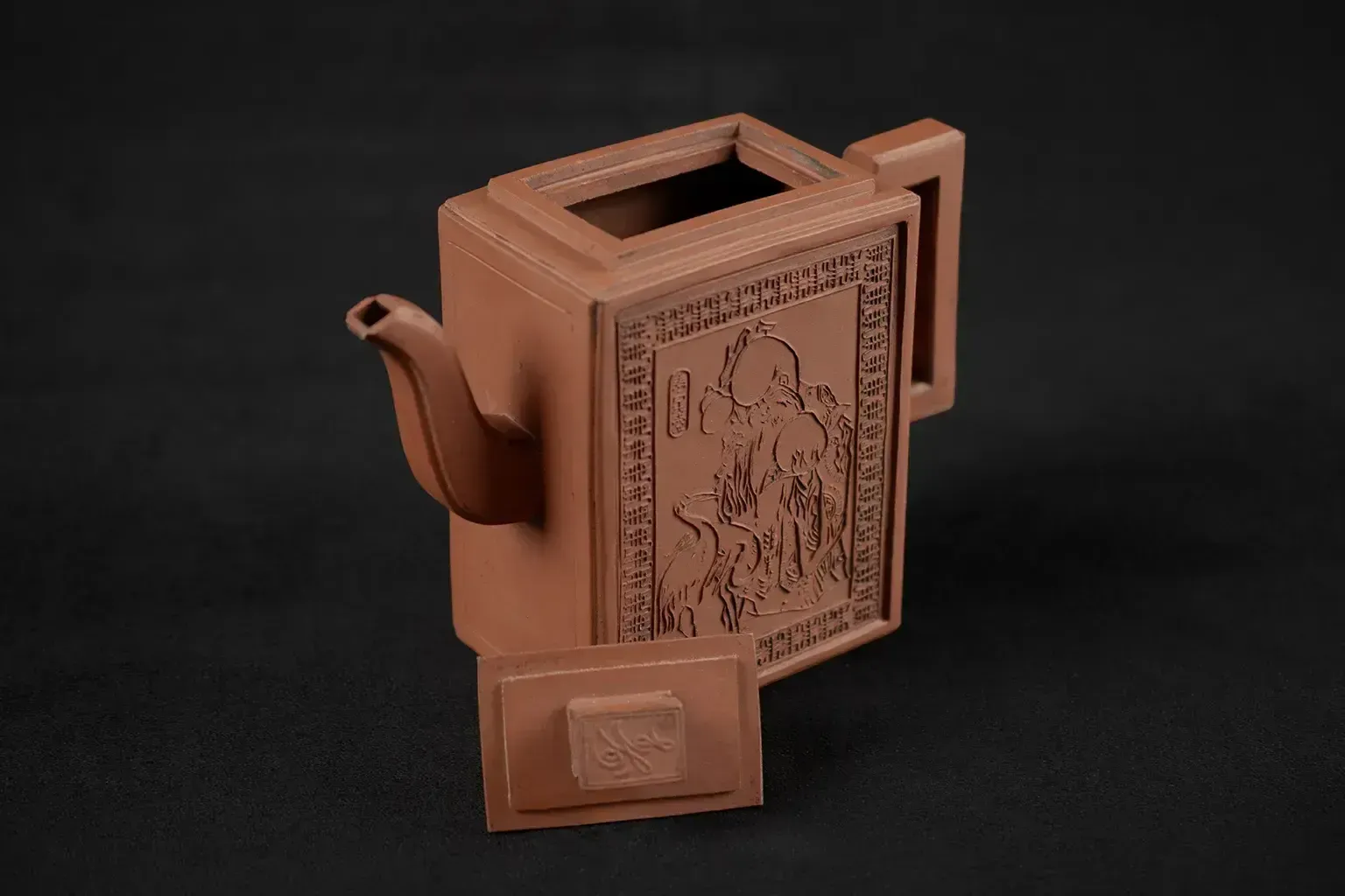 Traditional Yixing Stoneware Teapot Depicting Shouxing Shou Lao And His Attributes photo vinterior
