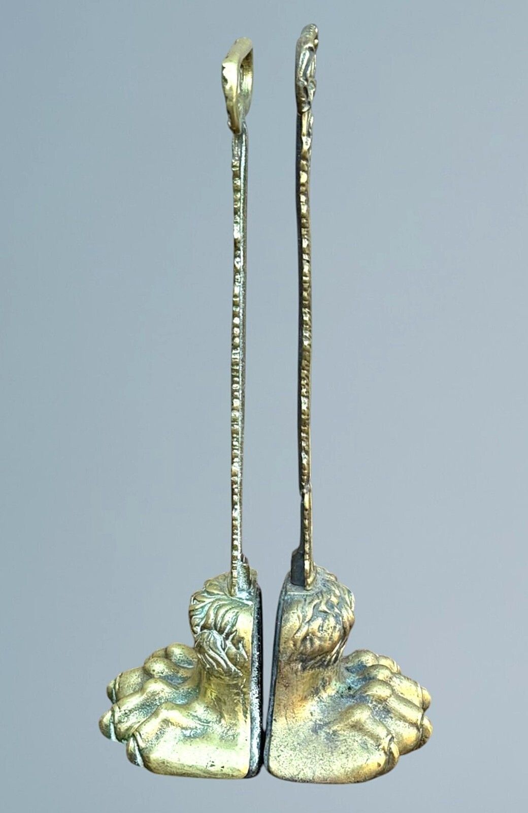 A Near Pair Of 19th Century Brass Lion Paw Door Porters photo for sale