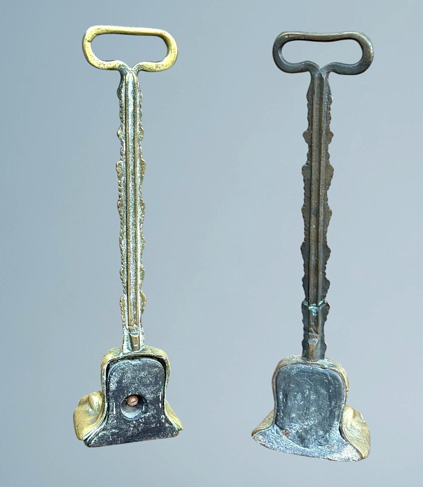 A Near Pair Of 19th Century Brass Lion Paw Door Porters photo 325.0