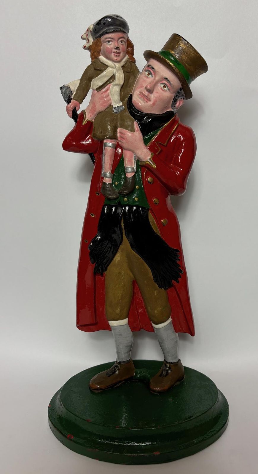 Early 20th‑Century Cast‑Iron Doorstop Of Bob Cratchit & Tiny Tim From Dickens’ A Christmas Carol.