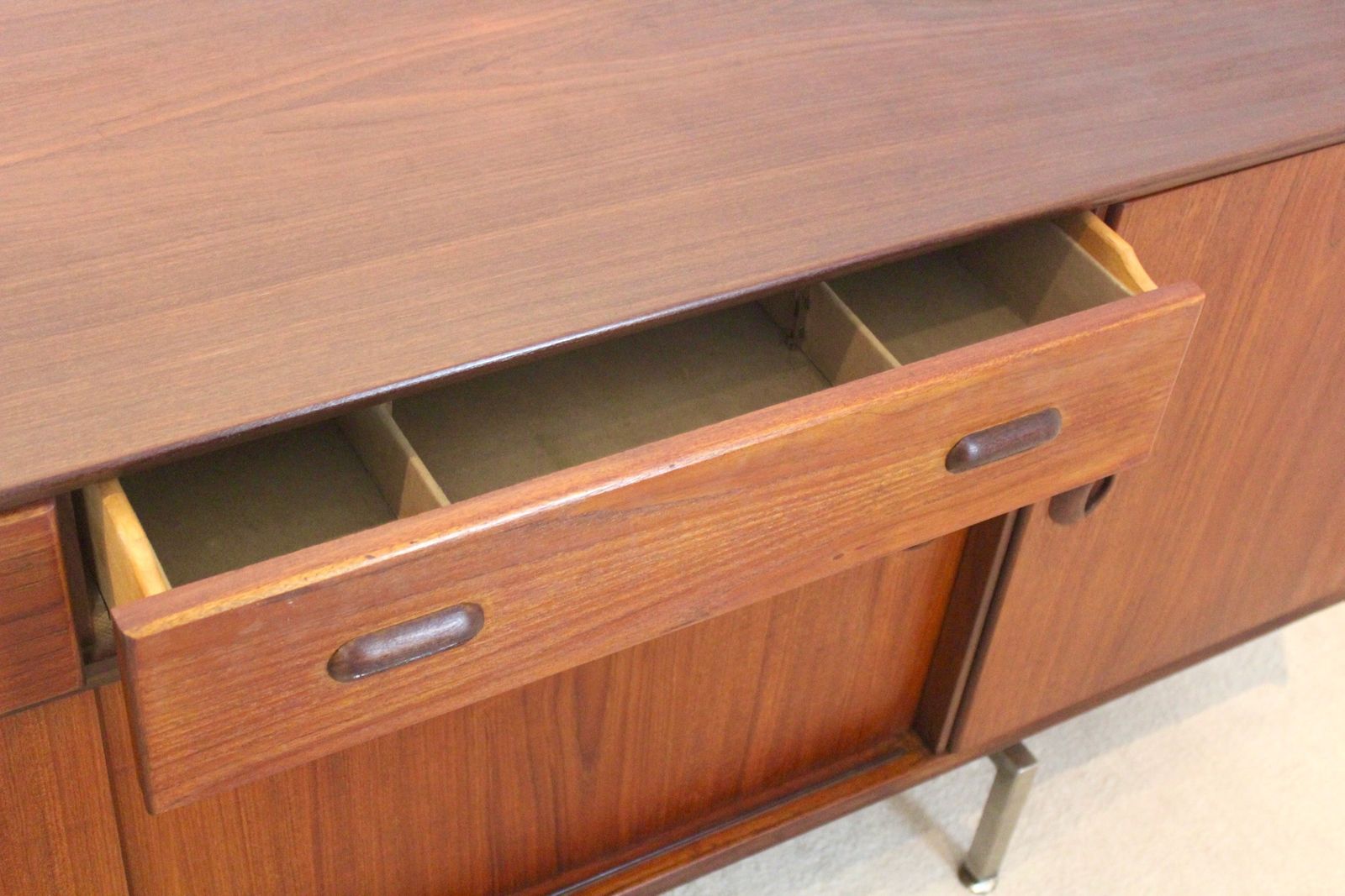 Mid Century Belgian Sideboard In Teak With Sculpted Handles And Steel Legs, 1960s photo vintage