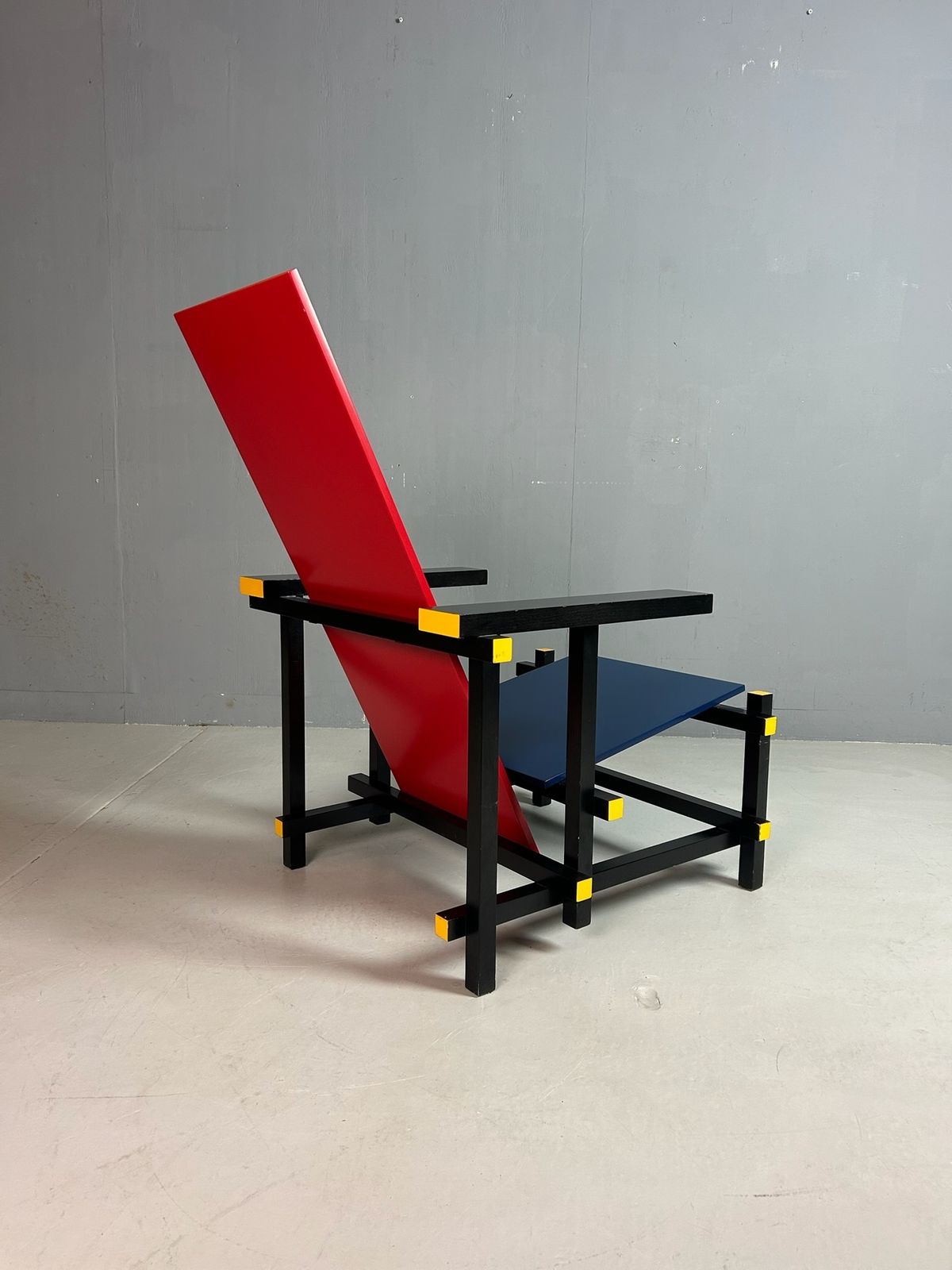 Gerrit Rietveld Red And Blue Chair By Cassina photo furniture