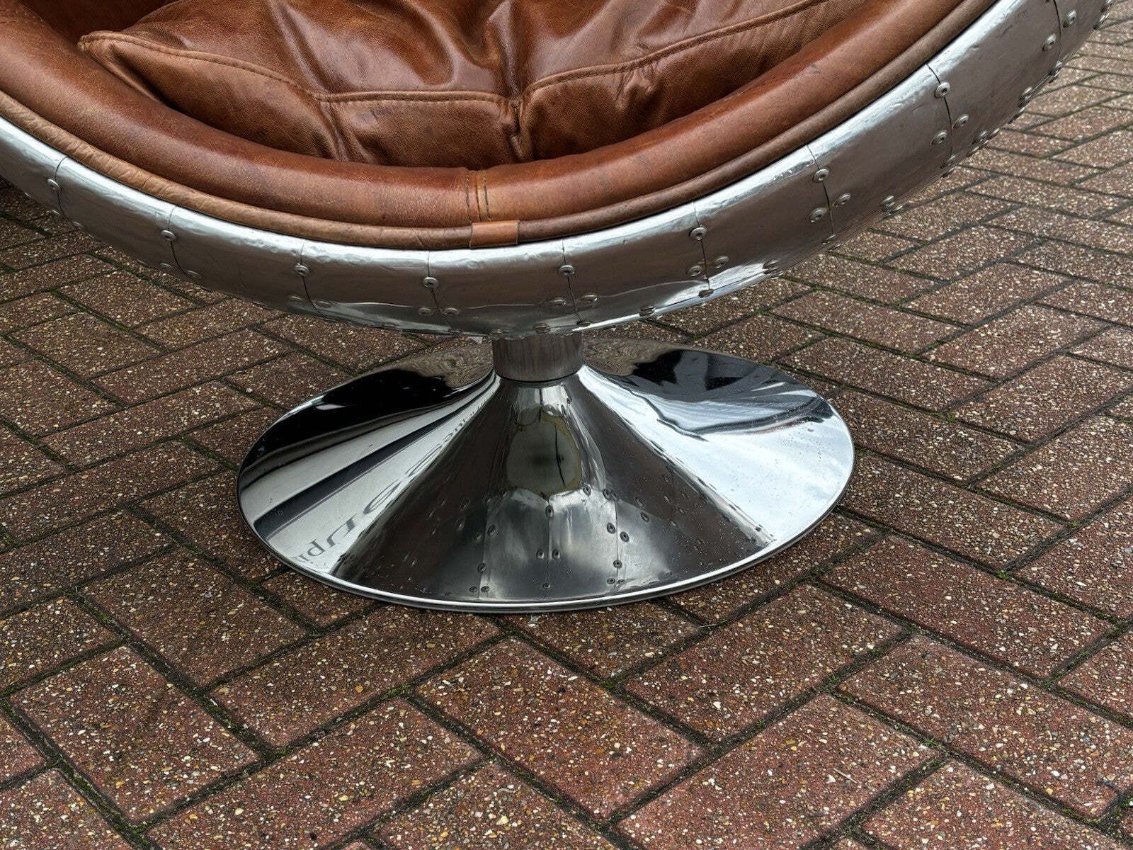 Aviation Swivel Egg Chair With Tan Leather. photo vintage