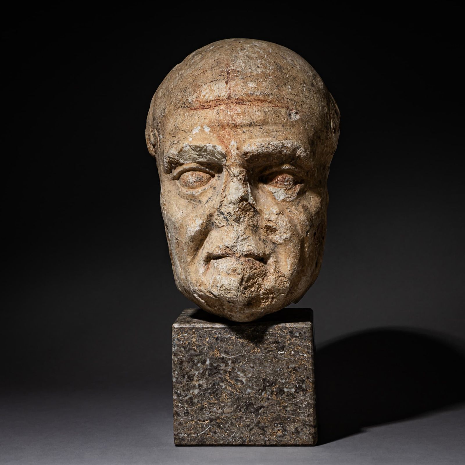 Marble Head Of An Elderly Man, Likely Roman photo for sale