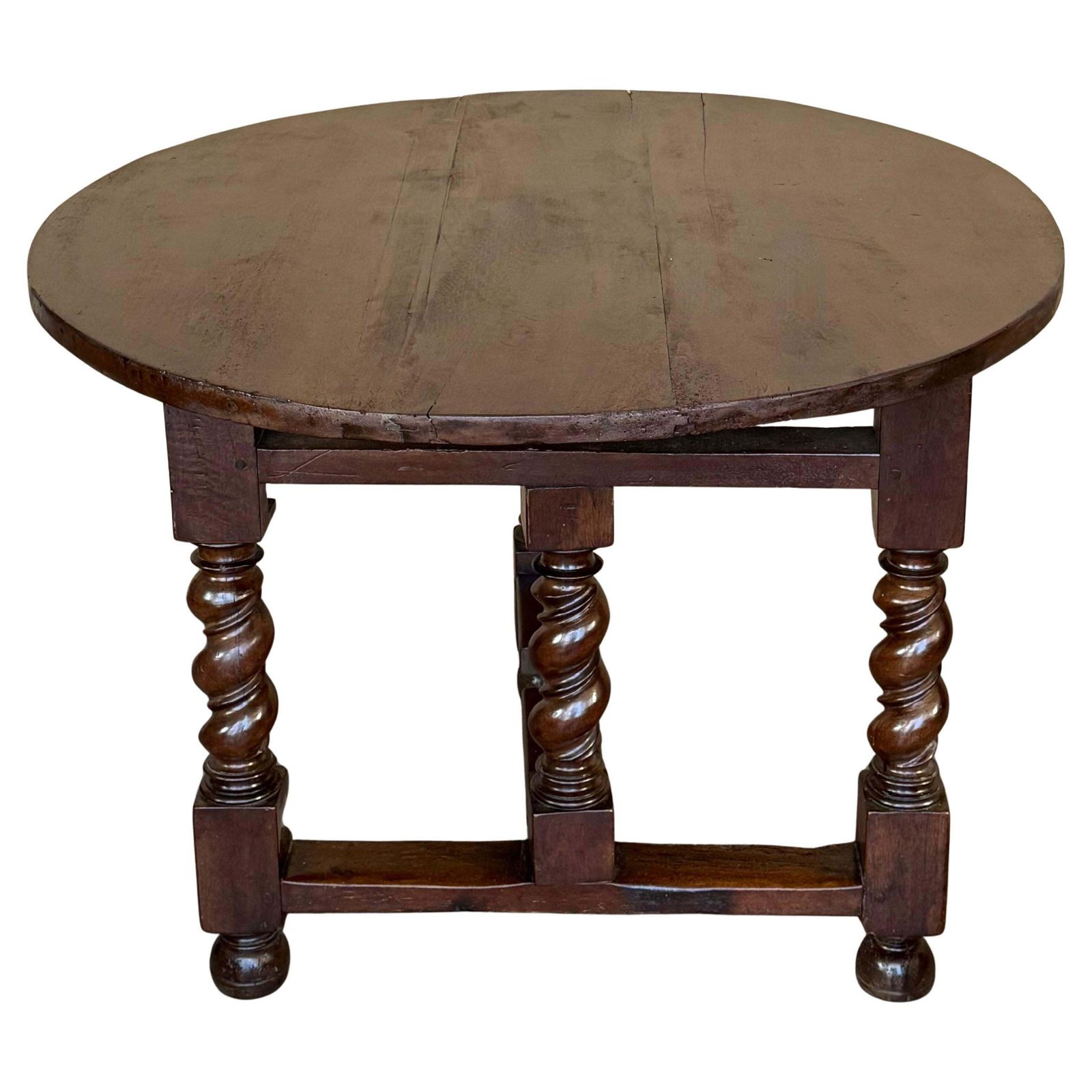 Table ronde pliante en noyer massif, pieds salomoniques, XIXe siècle