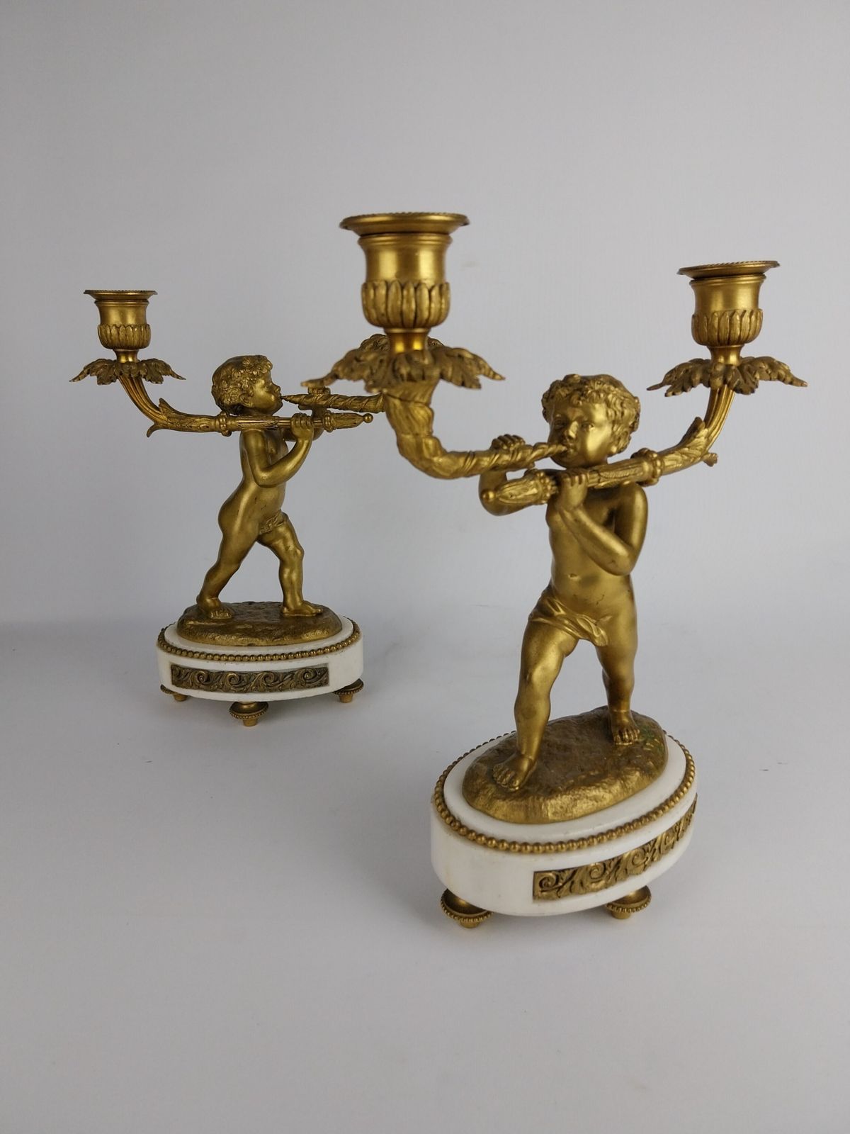 975.0 Pair Of Gilt Bronze Cherub Candlesticks photo
