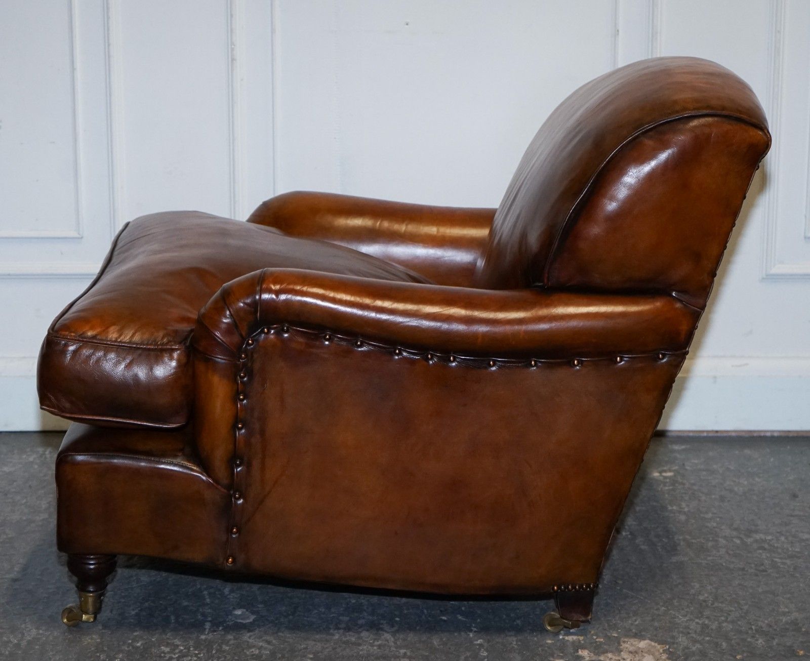 photo vintage Large Pair Howard Style Hand Dyed Leather Armchairs Feather Filled Cushions