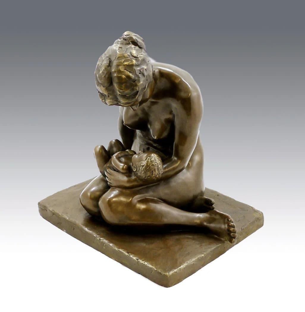 Bronze Sculpture Depicting A Mother And Her Child photo vinterior