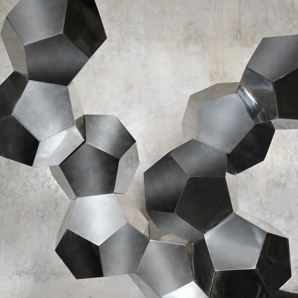 Contemporary Sculpture In Chromed Metal On A Black Marble Base photo 1999.0