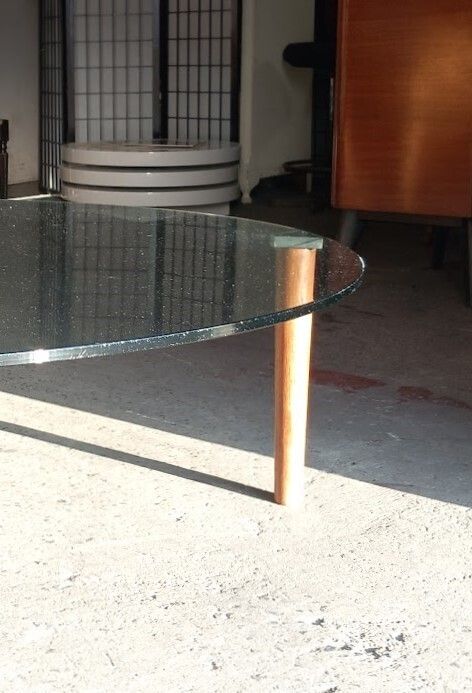 Glass Topped Minimalist Style Coffee Table With Teak Legs photo vinterior