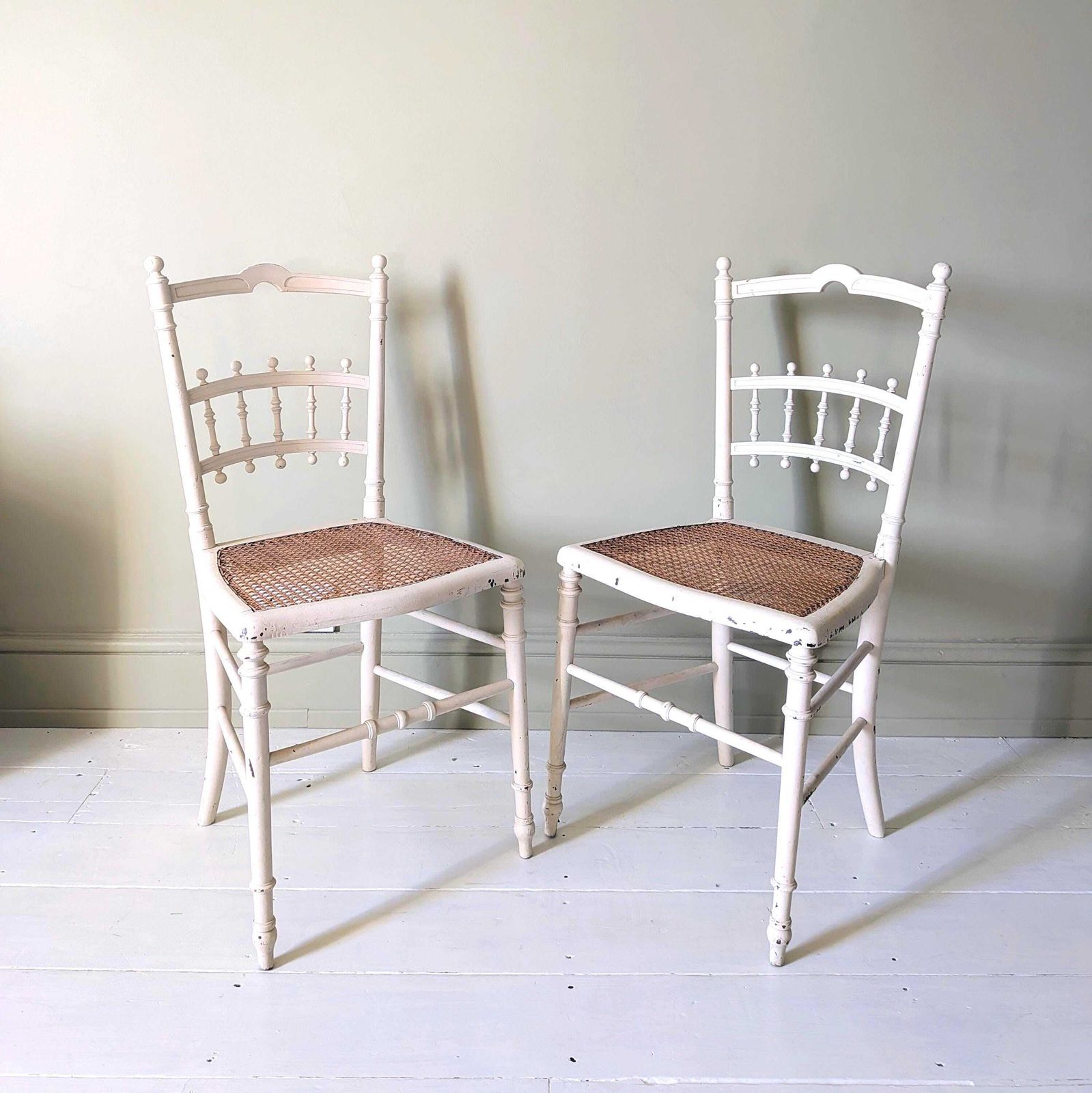 A Pretty Pair Of Antique French Painted Side Chairs With Cane Seats C1890