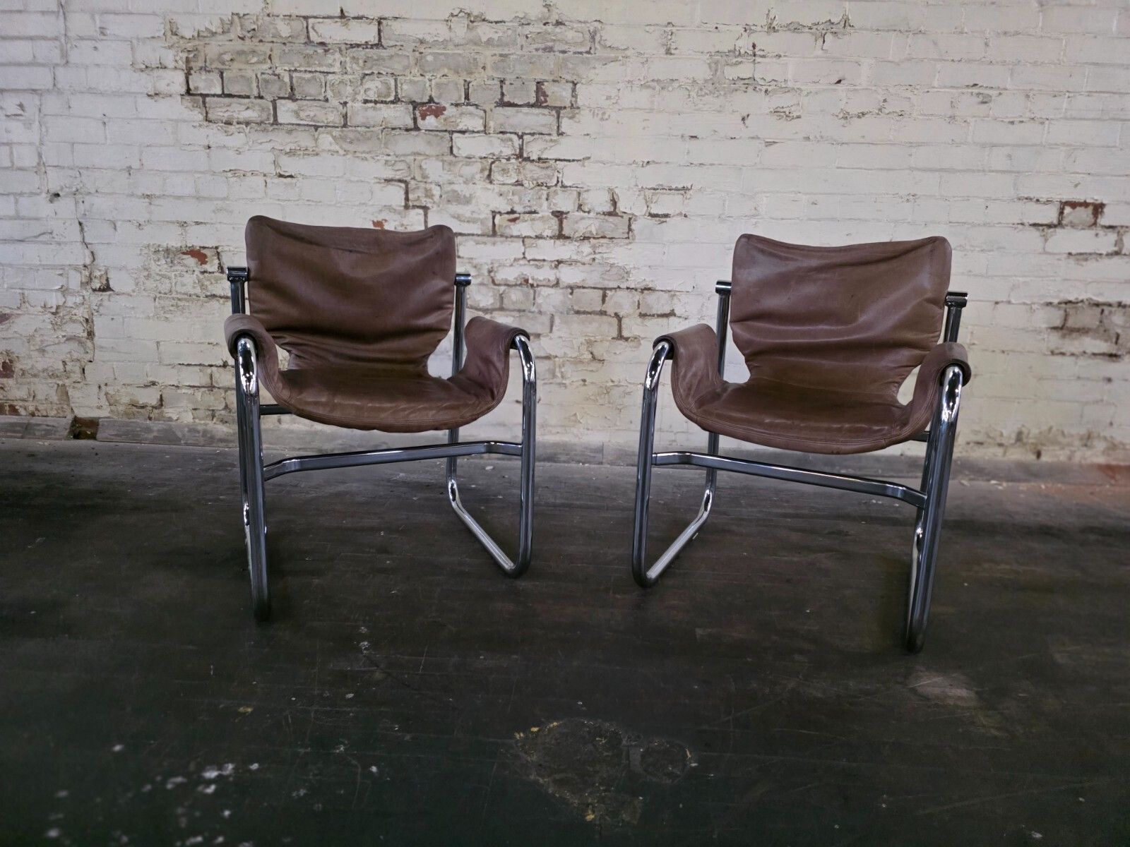 A Pair Of Mid Century Sling Chairs By Maurice Burke Circa 1960s photo furniture