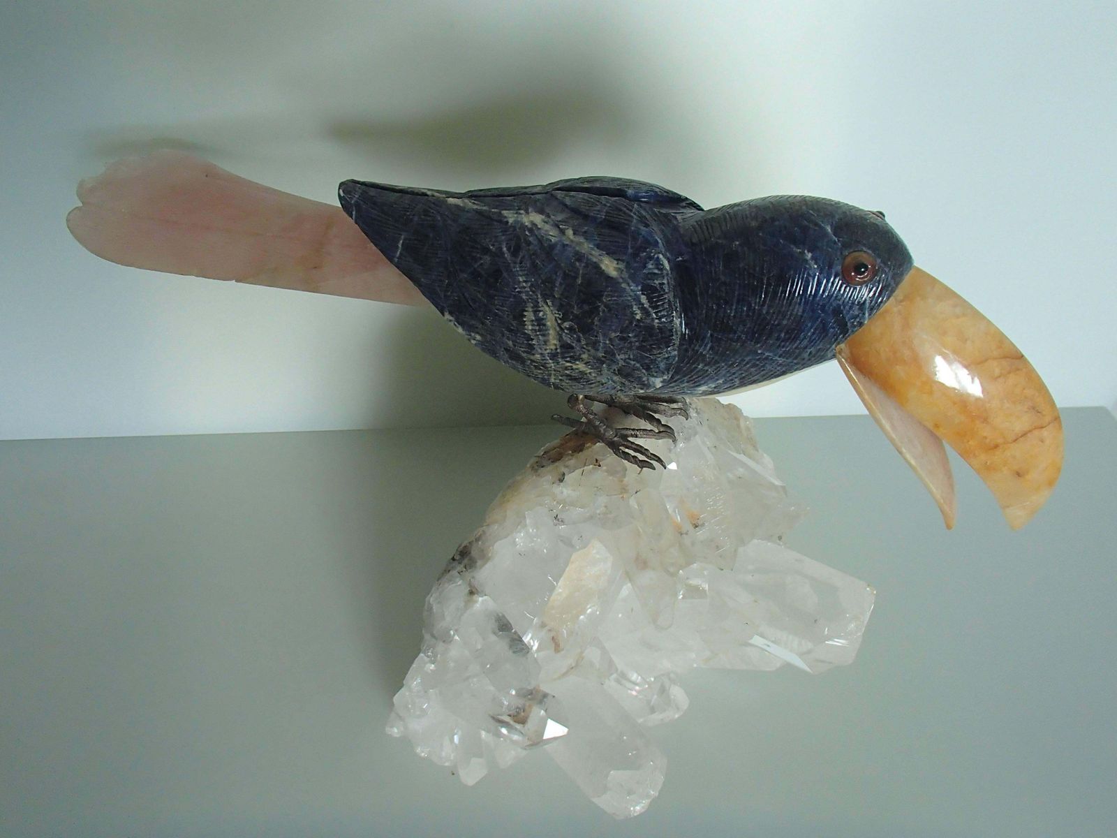 Tucan Sitting On A Cristall Made Of Sodalith And Rose Quarz photo Art