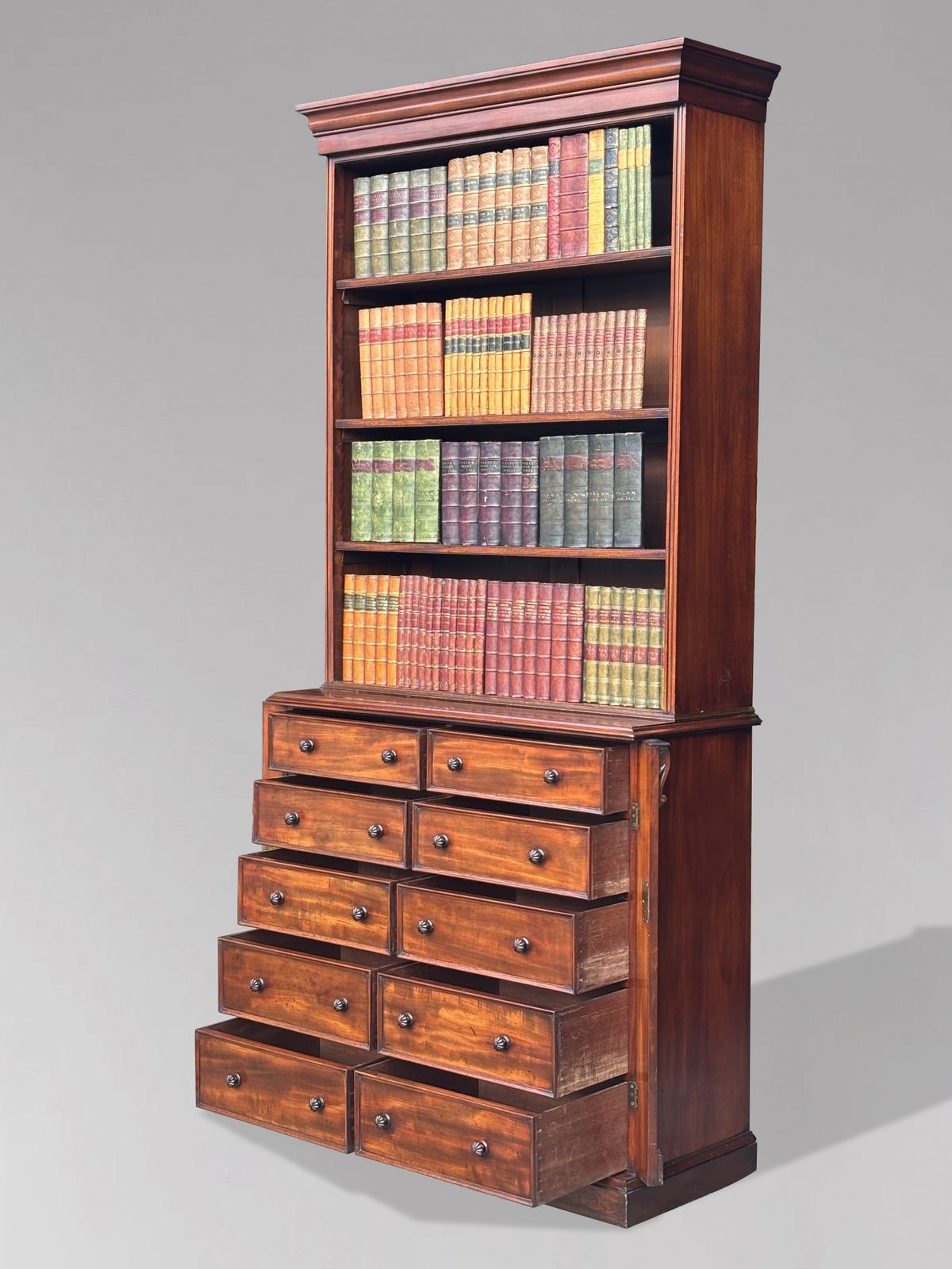 photo furniture Early 19th Century Regency Period Tall Mahogany Wellington Base Open Library Bookcase