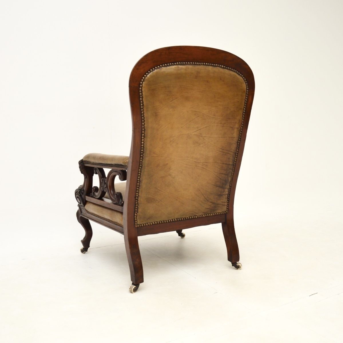 Furniture Antique Victorian Carved Mahogany And Leather Armchair photo