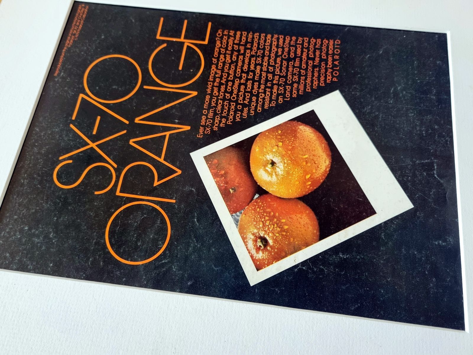 Photography Camera Print Ad, Polaroid Sx 70 Orange Campaign, Instant Film Advertising, 1970s Graphic photo vinterior