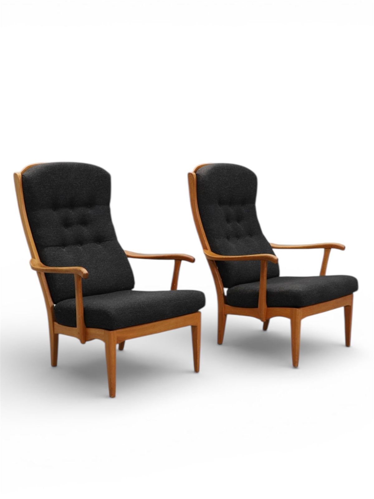 Carl Malmsten ‘Stora Fjäderbrickan’ Oak Lounge Armchairs .