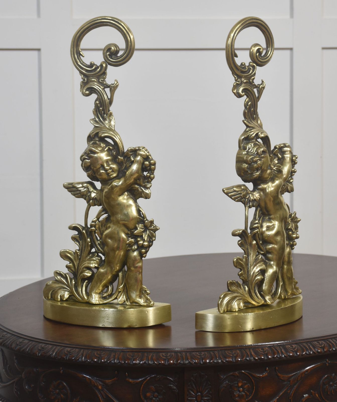 Pair Of Brass Putti Door Stops photo 954.0