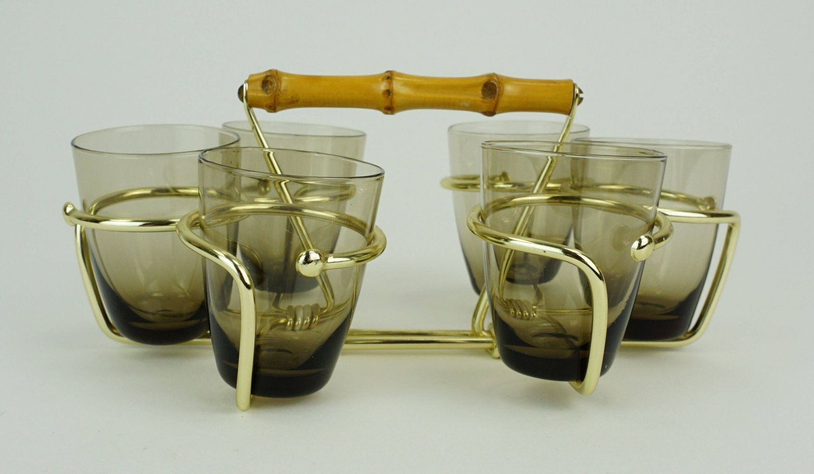 Set Of 6 Shot Glasses From The 1950s In A Brass Stand With A Bamboo Handle photo for sale