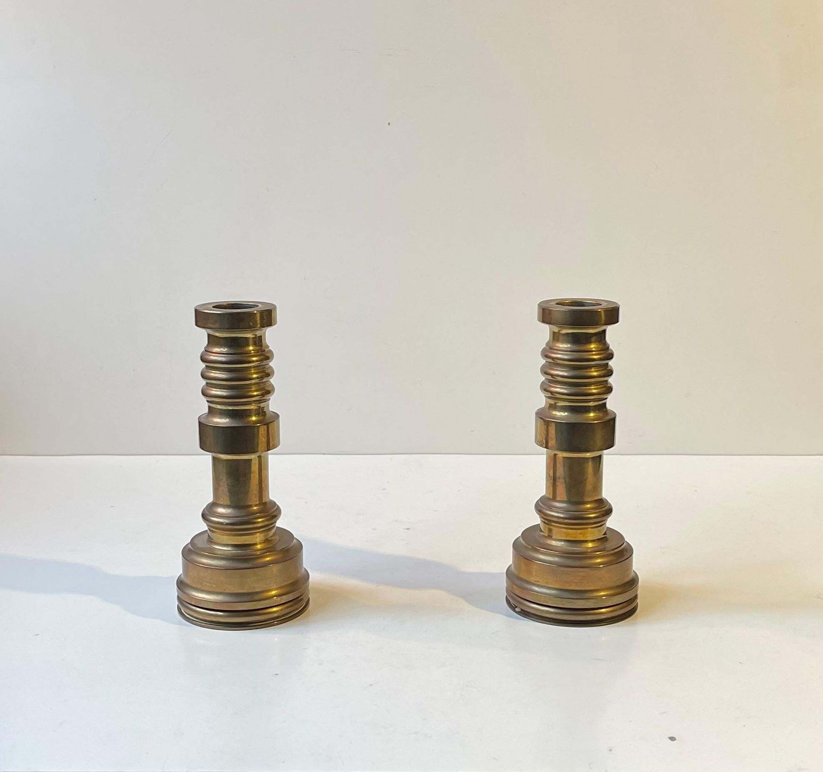 Midcentury Industrial Style Candlesticks In Bronze photo furniture