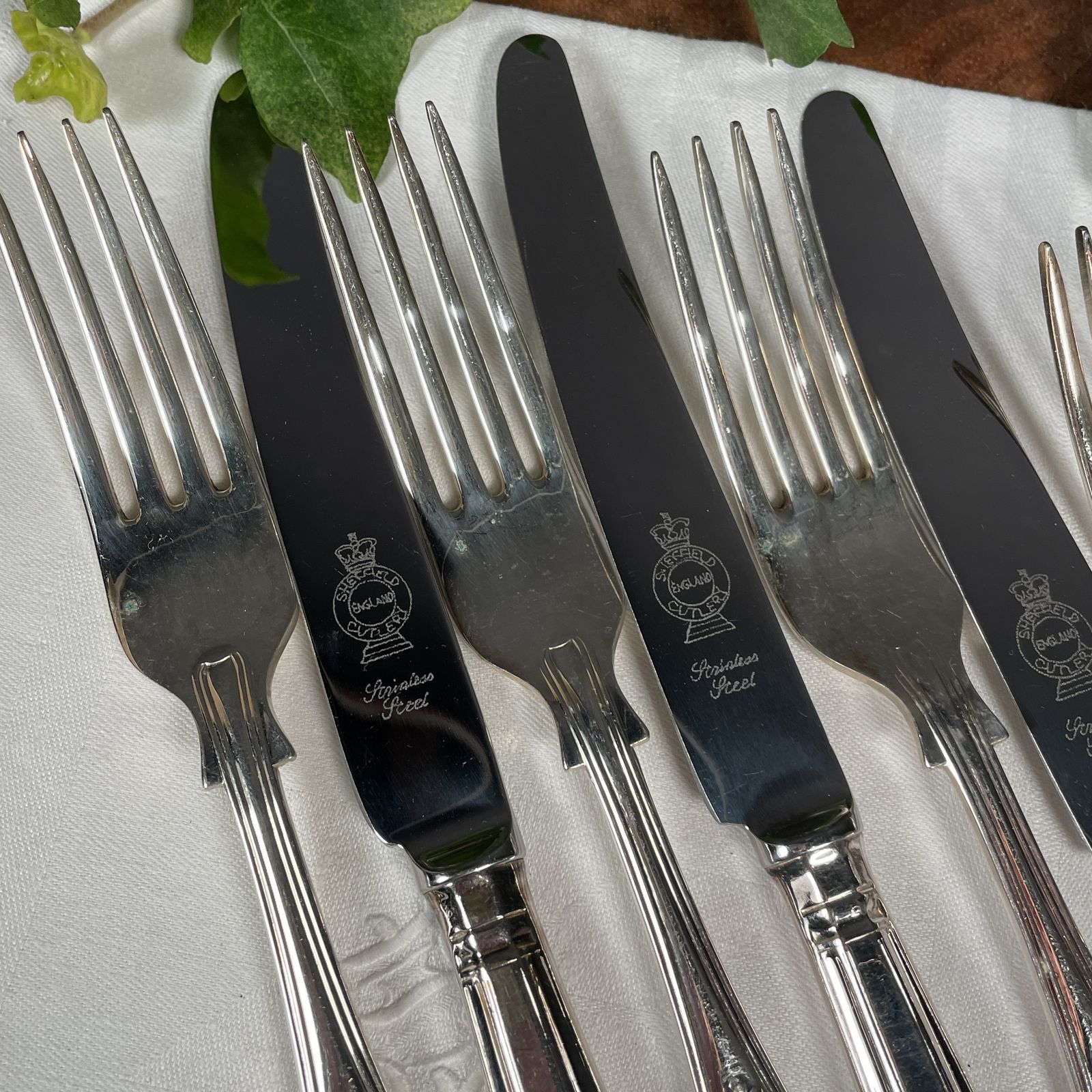 A Set Of Silver Plated Knives And Forks photo furniture
