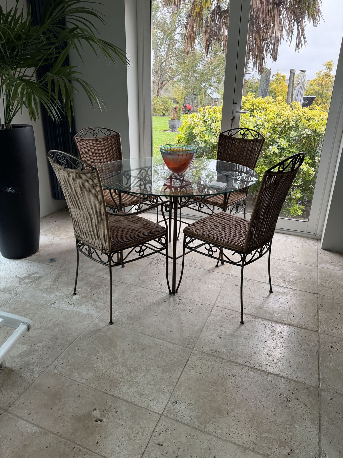 Round Glass Dining Table And 4 Brass & Wicker Chairs