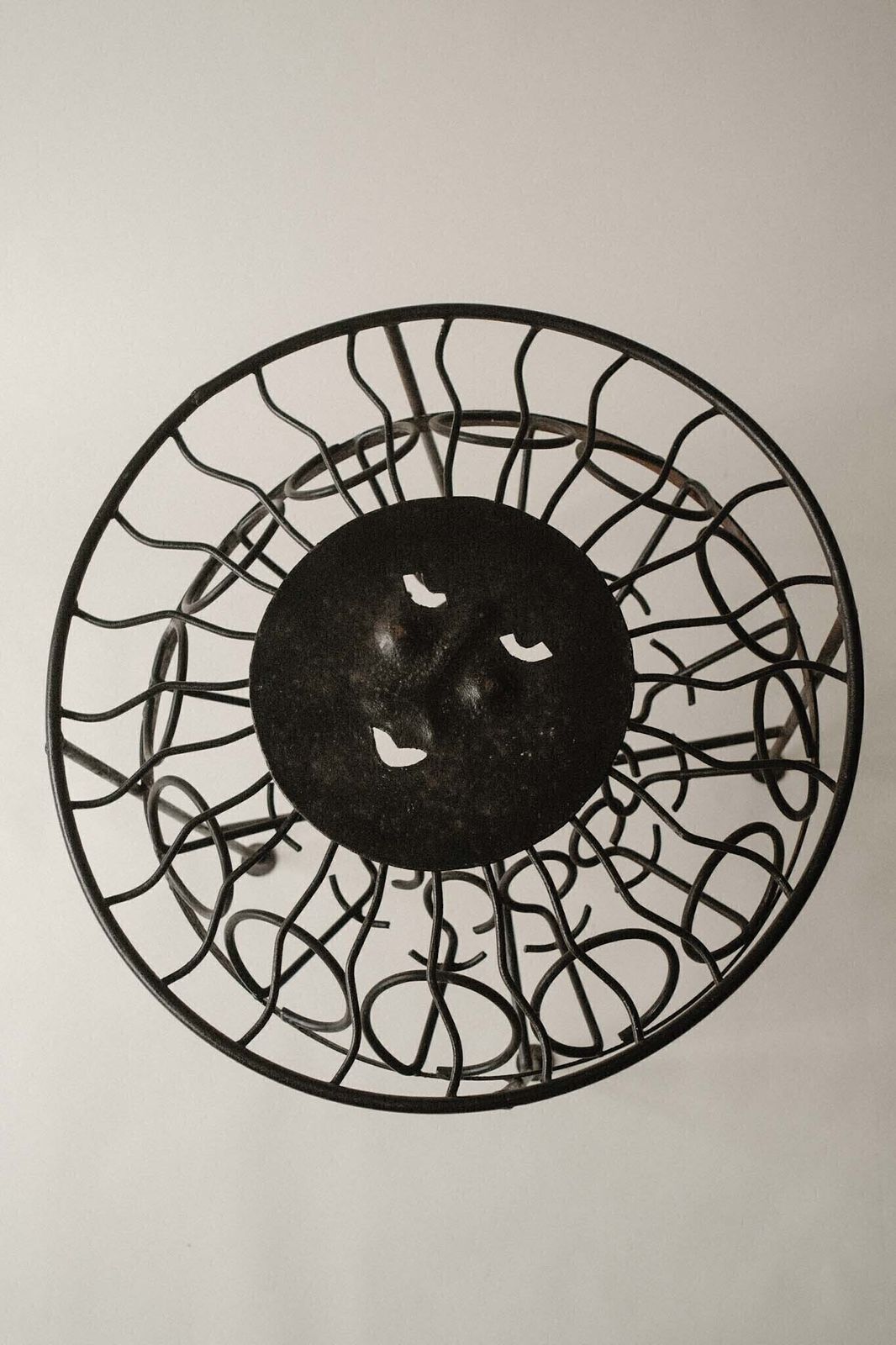 Sculptural Iron Table With Sunburst Face photo for sale