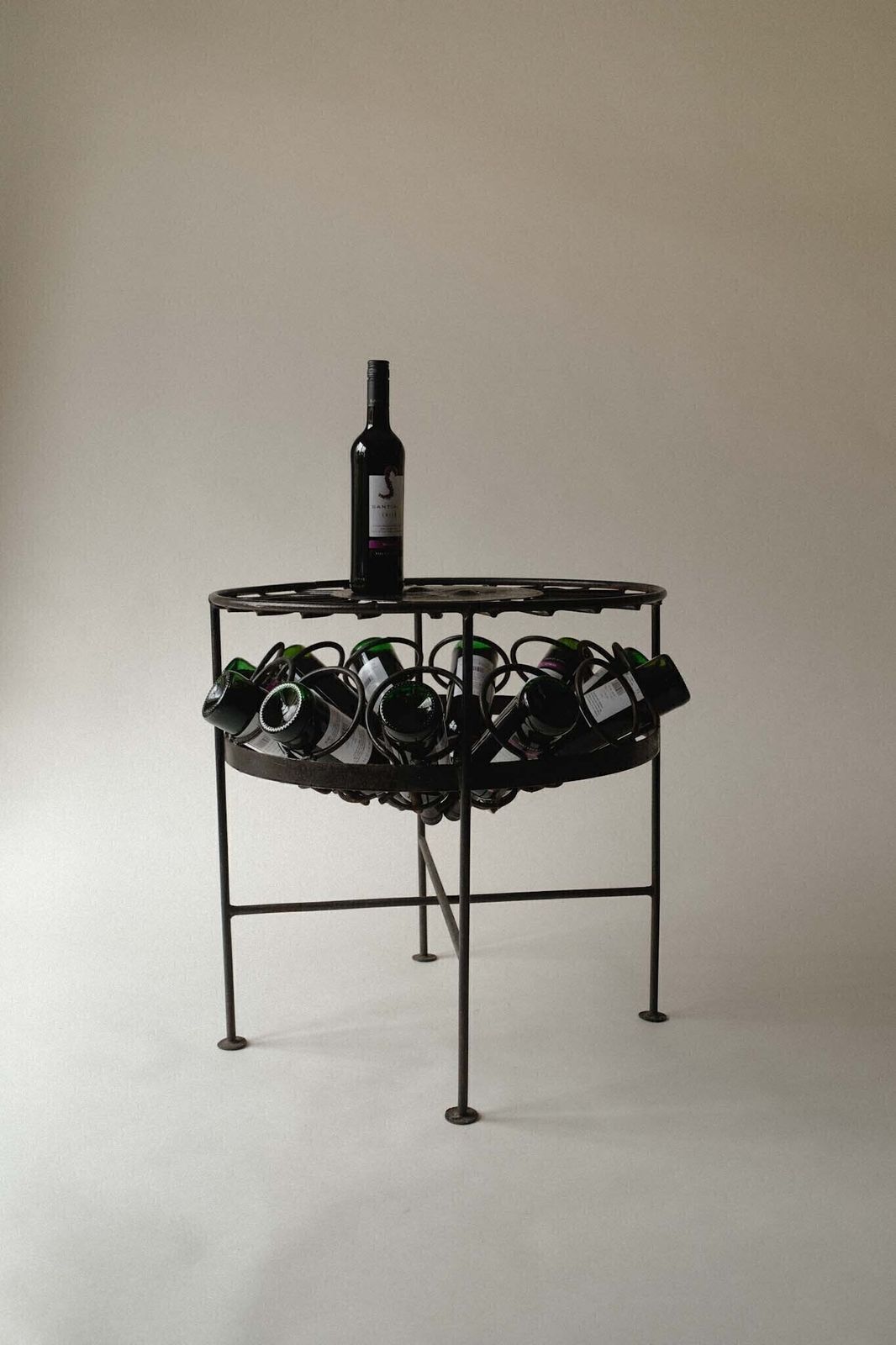 Sculptural Iron Table With Sunburst Face photo vinterior
