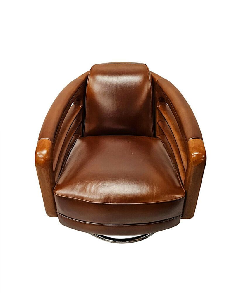 A Fabulous Hand Made Leather And Chrome Revolving Club Chair photo vinterior