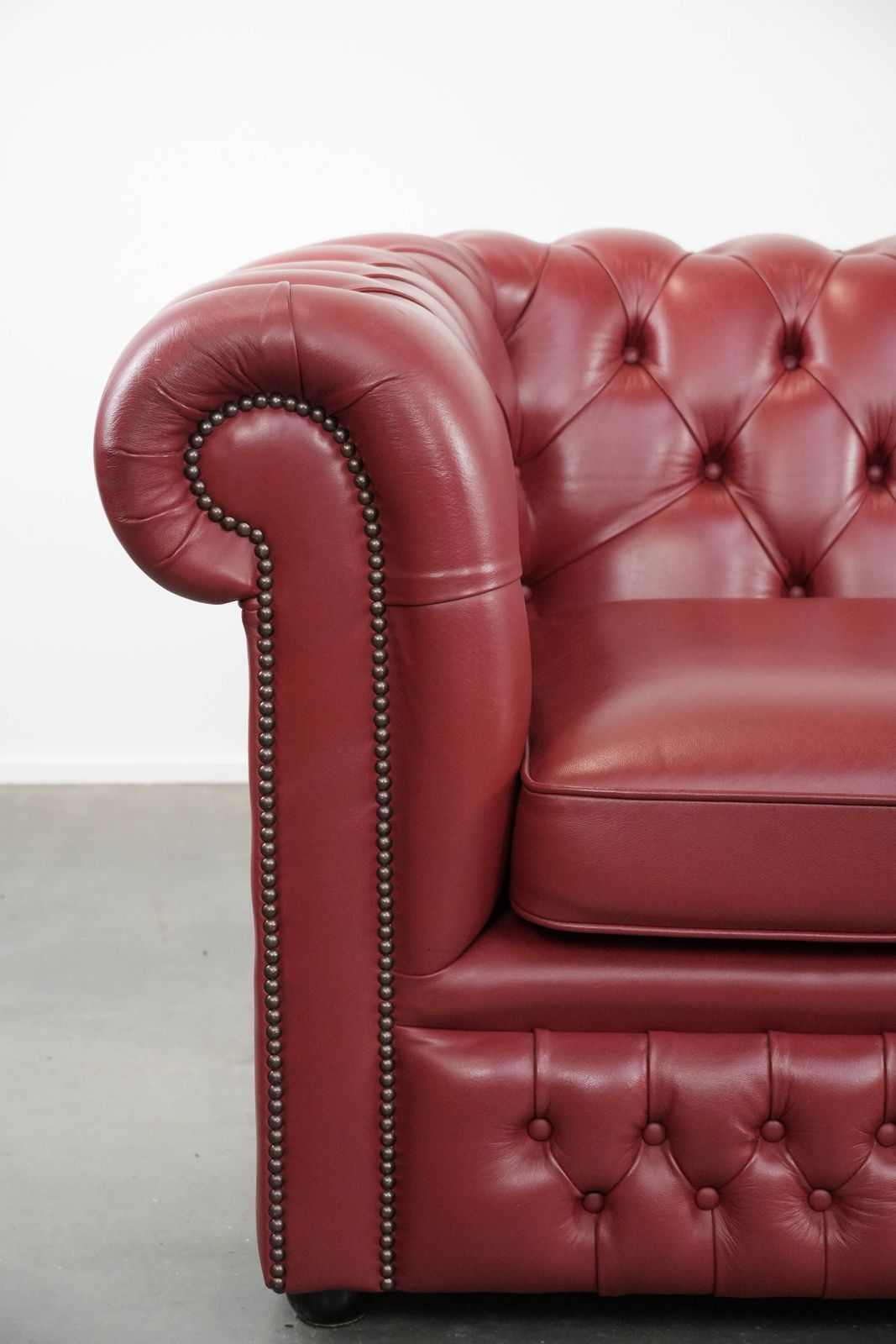 photo for sale Wonderful Set Consisting Of An English Cowhide Chesterfield 2.5 Seater Sofa And Matching Armchair In A Stunning Red Colour